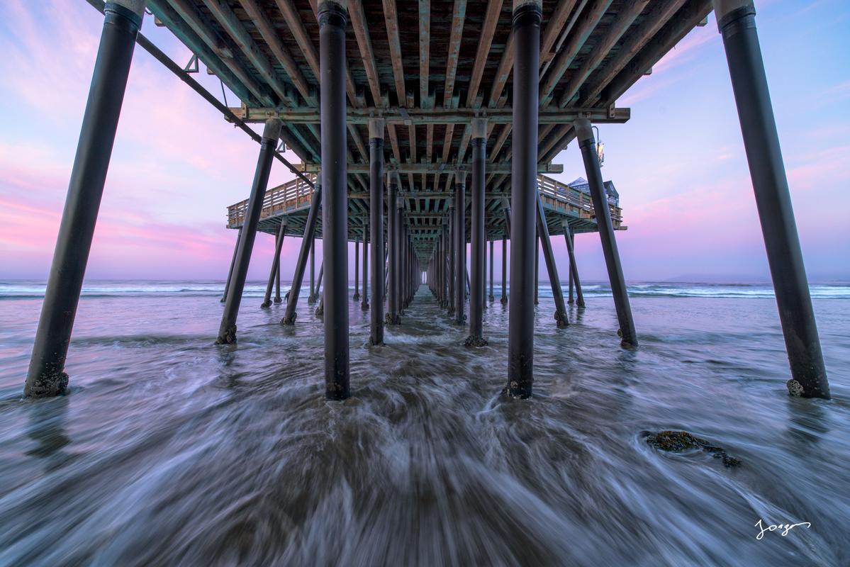pismo beach pier abstract fine art with waves rushing