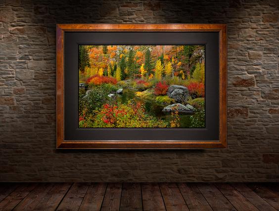 nature art photograph inside the light brown frame hanging on the brick wall as wall decor display