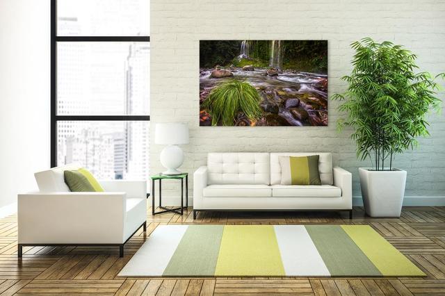 mossbrae falls large wall art display in the living room with furniture and plant