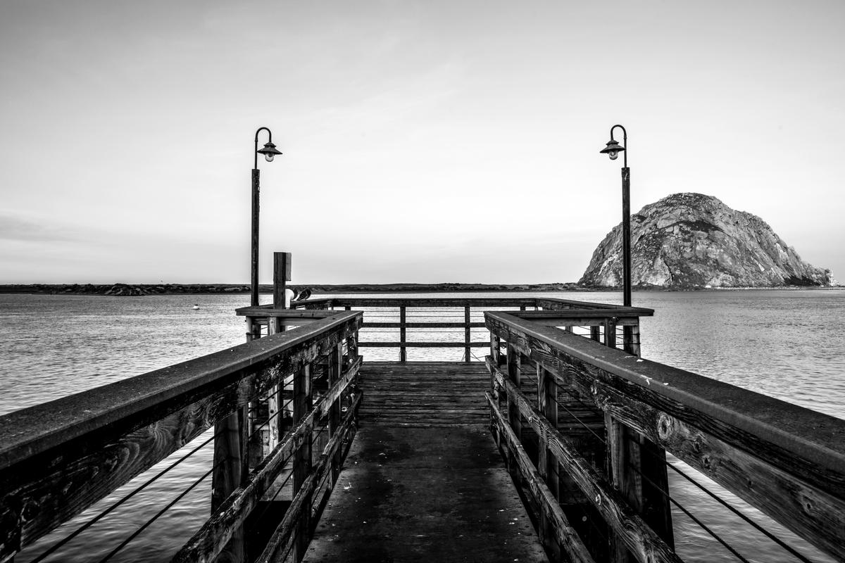 morro bay  pier and morro rock black and white photo