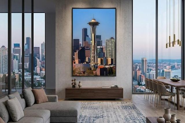 needle town artwork by Eddie Jongas framed on wall in a highrise luxury apartment