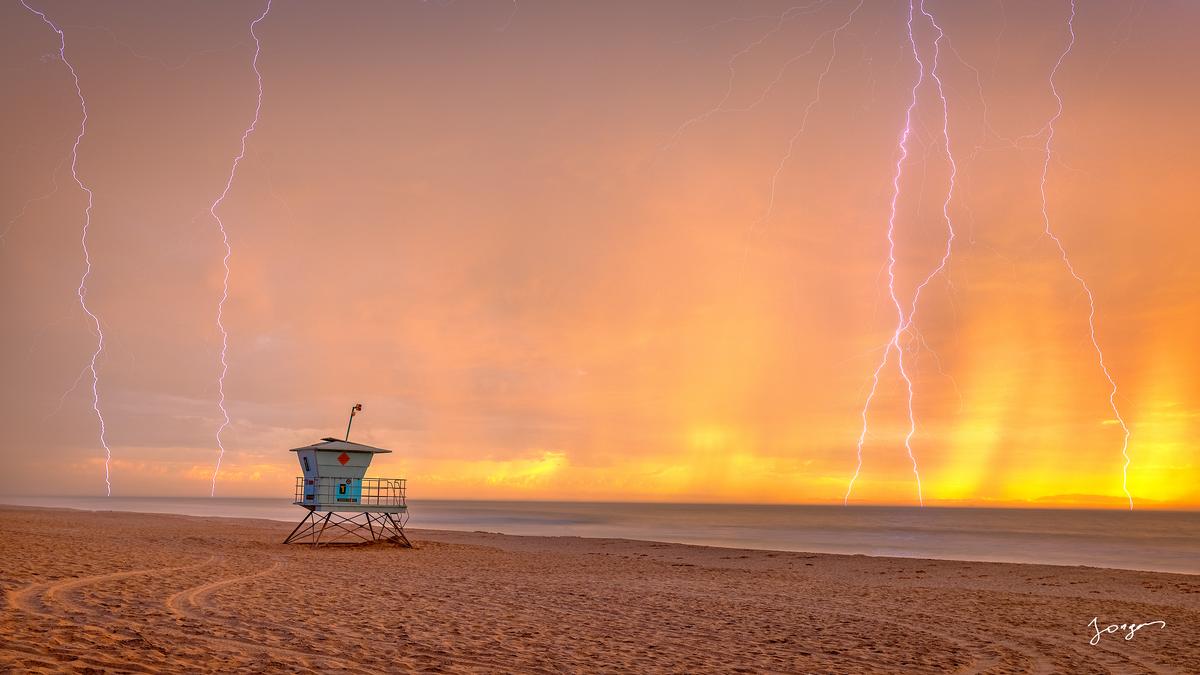 lifeguard booth on the beach incoming storm with lightning