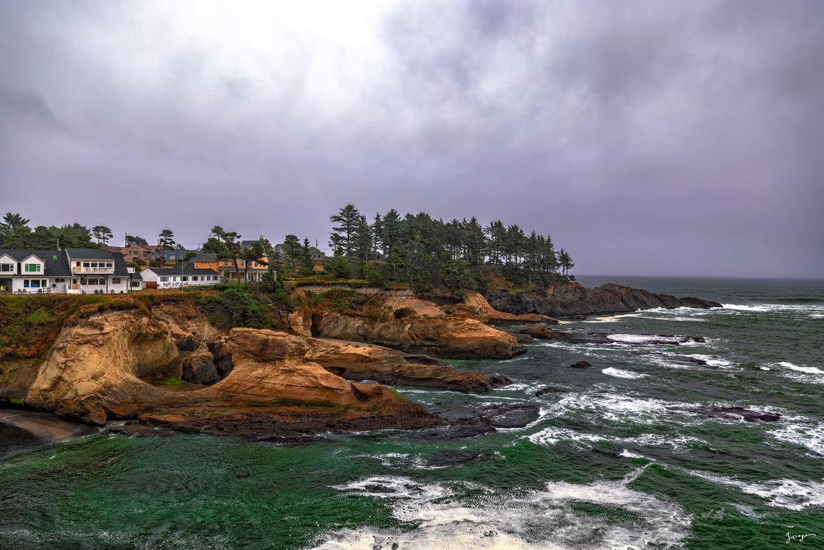 oregon coast ocean waves and bluffs during storm